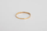 Cassis is a fine pavé ring made with 18k yellow gold and natural rubies.  Rubies have been long associated with power and wealth and not surprisingly, passion. This natural ruby pavé arc ring will brighten your day and stand the test of time. Looks beautiful both on it's own or layered with your other favourite gold rings.