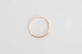 Cassis is a fine pavé ring made with 18k yellow gold and natural rubies.  Rubies have been long associated with power and wealth and not surprisingly, passion. This natural ruby pavé arc ring will brighten your day and stand the test of time. Looks beautiful both on it's own or layered with your other favourite gold rings.