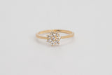 Étoile is a fine 18k yellow gold star shaped ring with simulated diamonds.   Carry a piece of the night sky with you with the stunning Étoile ring. Whether you are looking for a daily go to accessory or that perfect piece for a special occasion, this ring is a sleek addition to your everyday look.