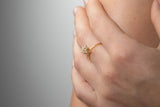 Le Bouquet is a fine bouquet ring made with 18k yellow gold and simulated diamonds.  Featuring a gorgeous flower design, this showstopper is a very feminine and delicate ring and it's the ultimate femme cocktail ring. Look no further if you are looking for that perfect piece to compliment your special occasion look.