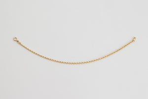 Clemence is a beautiful twisted bracelet made with solid 18k yellow gold.  This twisted chain design was made to feel ultra luxurious. This classic bracelet can be worn by itself or it can be a versatile layering piece.