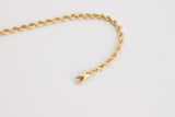 Clemence is a beautiful twisted bracelet made with solid 18k yellow gold.  This twisted chain design was made to feel ultra luxurious. This classic bracelet can be worn by itself or it can be a versatile layering piece.