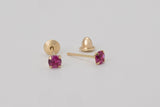 Èze is a pair of fine stud earrings made with 18k yellow gold and simulated rubies.  Simple and elegant, these mini ruby studs are one of our classic ear stack staples.