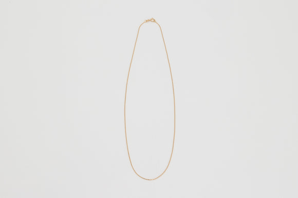 Theodore is a fine studded necklace made with 18k yellow gold.  This dainty studded solid gold necklace can be worn by itself or it can be layered with another gold chain or fine necklace, as many as you wish.