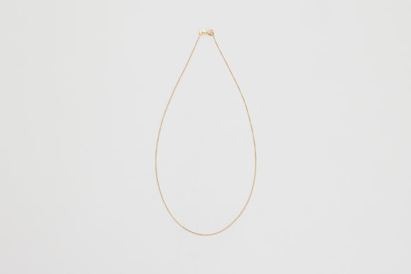 Cecile is a fine 18k yellow gold chain necklace.  Unforgettably subtle, this fine 18k yellow gold necklace is a definitive piece for layering or to add that special gold pendant.
