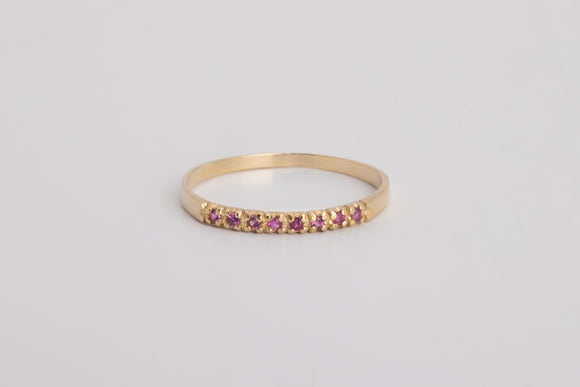 Cassis is a fine pavé ring made with 18k yellow gold and natural rubies.  Rubies have been long associated with power and wealth and not surprisingly, passion. This natural ruby pavé arc ring will brighten your day and stand the test of time. Looks beautiful both on it's own or layered with your other favourite gold rings.