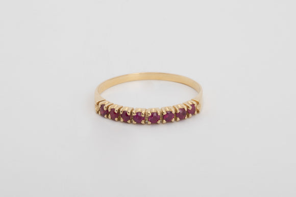 Charlotte is a fine 18k yellow gold and natural ruby ring.  Long considered a stone of kings by many cultures, rubies also have been long associated with power and wealth and not surprisingly, passion. This natural ruby ring will stand the test of time with it's heirloom quality. 
